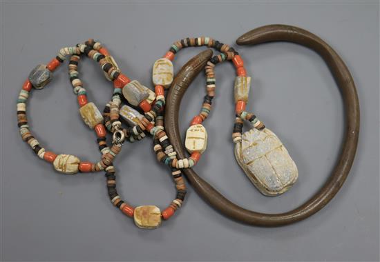 A Roman torque and Egyptian scarab necklace